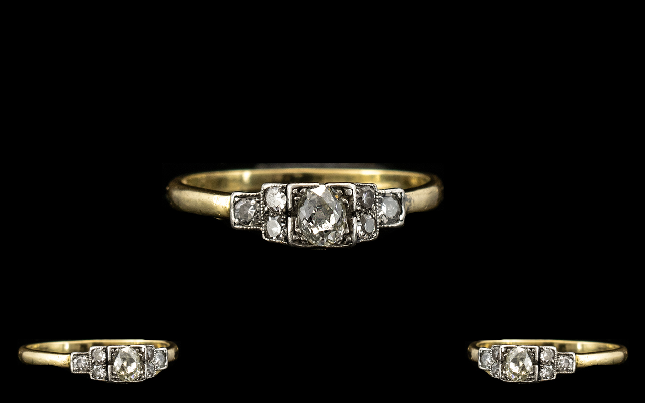 18ct Gold and Platinum Diamond Set Ring - From the 1930's. Marked 18ct Gold and Platinum. The