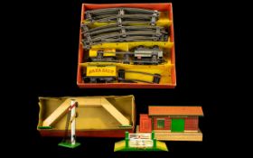 Four Boxed Hornby by Meccano Items to include tracks and carriages, level crossing, station house,