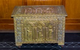 A Large Brass Bible Box in the form of a Chest. Embossed brass plates to front, rear and sides.