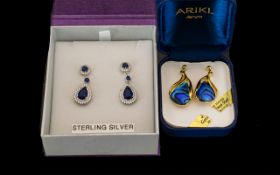 Two Pairs of Dress Earrings - one pair Ariki 22ct gold plated Shell earrings for pierced ears,