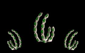 Green Jade Elongated J-Hoop Earrings, each earring having six marquise cut green jade set to the