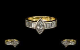 A Stunning Quality 18ct Two Tone Gold Marquise Diamond and Baguette Cut Diamond Ring of