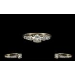 18ct White Gold Superb Quality Diamond Set Dress Ring. Marked 750 - 18ct. The Central Brilliant