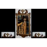 Antique Chippendale Mirror - in mahogany and gilt wood with a large winged eagle finial captured in