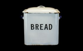 Vintage Metal Bread Bin in traditional style in white with navy handles and white lid.