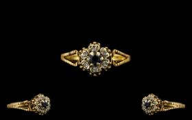 18ct Yellow Gold Sapphire and Diamonds Set Cluster Ring, Flower head Design. Marked 18ct.