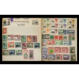 A Green Spring Back Stanley Gibbons Swiftsure Expanding Stamp Album with a large quantity of King