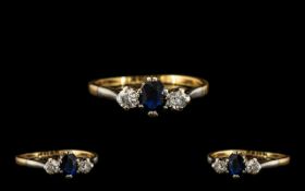 18ct Gold and Platinum Attractive 3 Stone Diamond and Sapphire Set Dress Ring.