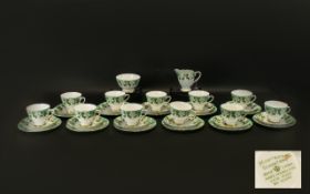 Montrose 'Gladstone' Bone China Tea Service in white ground with pale green border with winter rose