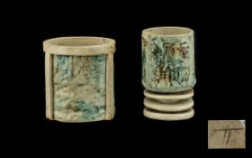 Two Troika Style Art Pottery Vases with a fine cream and blue glaze.