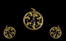 Antique 9ct Gold And Amethyst Set Pendant Of open, circular form with delicate in foliate border,