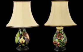 A Fine Pair of Modern Moorcroft Tube lined Table Lamps.