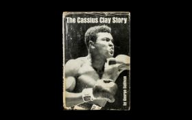 Boxing Interest. Hard back book titled 'The Cassius Clay Story by George Sullivan'. Fleet Publishing