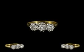 18ct Gold and Platinum 3 Stone Diamond Ring - Illusion Set. Marked 18ct - 750. The Three Diamonds of