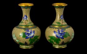 A Pair of Cloisonne Vases with blue and green flower and bird decoration, height 6".