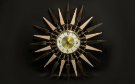 A Paico Starburst Wall Clock in a statement sculptural eye-catching design c1960's 20 inches in