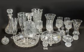 A Cut Glass Drinking Set comprising of two good quality cut glass decanters,