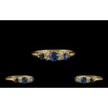 18ct Gold - Attractive 5 Stone Sapphire and Diamond Set Dress Ring, Gallery Setting.