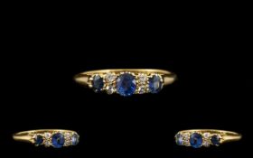 18ct Gold - Attractive 5 Stone Sapphire and Diamond Set Dress Ring, Gallery Setting.
