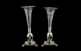 Two Silver Plate Glass Epergnes with scrolled fish decoration. As found condition. Height 7".