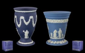 Two Large Wedgwood Vases comprising Portland blue Jasper Ware Rose Border design no 3085 and a Pale