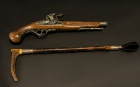 Riding Crop Along With a Flintlock Replica Gun. Approx size of the Riding Crop Is 18.