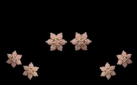 Pink Opal Flower Cluster Earrings, each earring comprising seven round cut pink opals, set in
