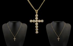 9ct Gold Diamond Set Cross with Attached 9ct Gold Chain. Est Diamond Weight 1.