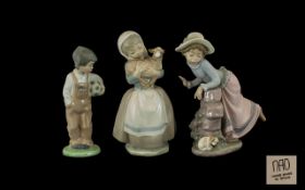 Nao by Lladro Figures ( 3 ) Three In Total. Comprises 1/ Young Girl Dressed In Long Dress and