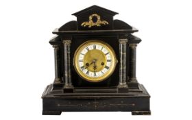 Black Mantel Clock - decorated with gilt,