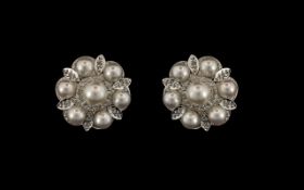 Ladies - Attractive 1950's Platinum Set Pair of Diamonds and Pearls Earrings. c.1950's. Flower