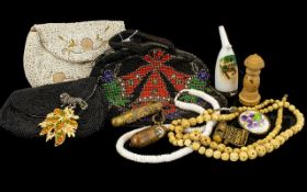 Collection of Vintage Items to include three beaded bags; a bag with black ground and red,