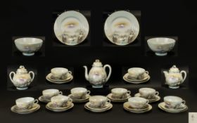 Japanese Porcelain Tea Set marked to base, comprising a coffee pot; 12 trios of cups, saucers and