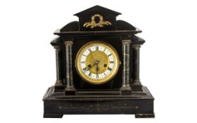 Black Mantel Clock - decorated with gilt