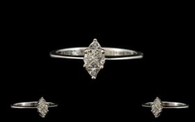 Ladies - Attractive and Petite 18ct White Gold Diamond Set Ring. Marked 750 - 18ct.