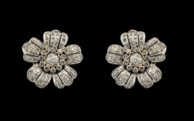 An Antique Pair of Stunning 18ct White Gold Diamond Set Earrings of Large Proportions In a Flower