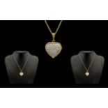 18ct Gold Heart Shaped Diamond Set Pendant Attached to a 18ct Gold Chain,