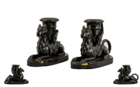 A Pair of Victorian Figural Griffin Cand