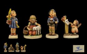 Four Hummel Figurines comprising Boy wit