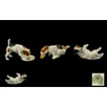 Royal Doulton Small Collection of Dog Figures (3) in total. 1. Character Dog with Plate HN 1158