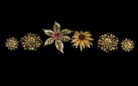 Collection of Five Vintage Gold Tone Sarah Coventry brooches. One brooch with matching earrings of