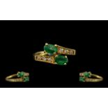 18ct Gold Superb Quality and Attractive Emerald and Diamond Dress Ring of contemporary design. The