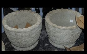 Two Acorn Pots - circular planters featuring oak leaves and acorns.