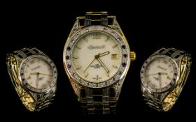 Ingersoll Gents Two Tone Steel Diamond & Ruby Set Date Just Quartz Wrist Watch. The Bezel set with