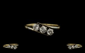 18ct Gold and Platinum 3 Stone Diamond Set Ring. Marked 18ct and Platinum. The 3 Diamonds of