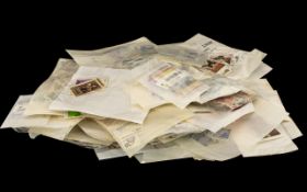 Large Bag of Mixed Stamps - sorted into packets.