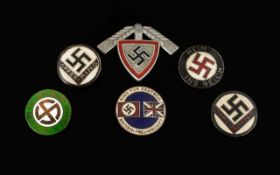 A Collection of Six Enamelled German Badges depicting Swastikas and Third Reich.