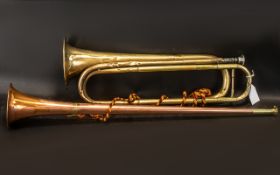 A Brass Trumpet with silver mouth piece. Marked 'van muziekinstrumenten tilburg'.