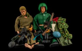 Two Vintage Action Men along with outfits and accessories.