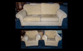 Three Piece Suite comprising a three-seater sofa and two armchairs,